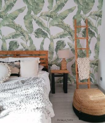 Motivtapete Ein Moment der Entspannung im Schatten eines Bananenbaums