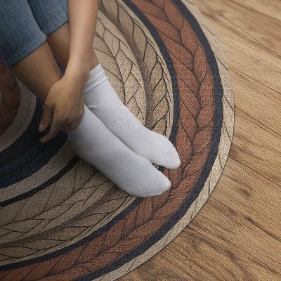 Runder teppich auf pvc Gestricktes Garn in erdigen Tönen