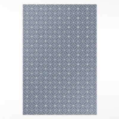 Teppich auf pvc Muster gespickt mit regelmäßigen Kreisen und Blumen