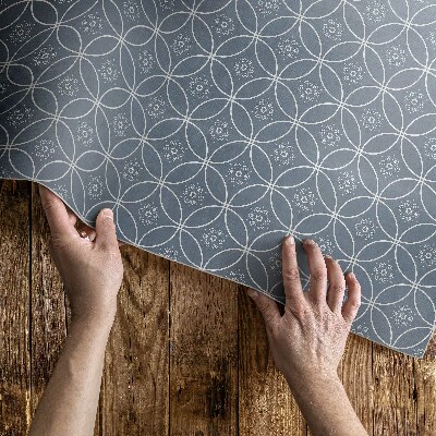Teppich auf pvc Muster gespickt mit regelmäßigen Kreisen und Blumen