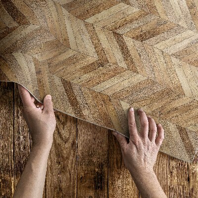 Teppich auf pvc Trendiges Fischgrät-Holzparkett