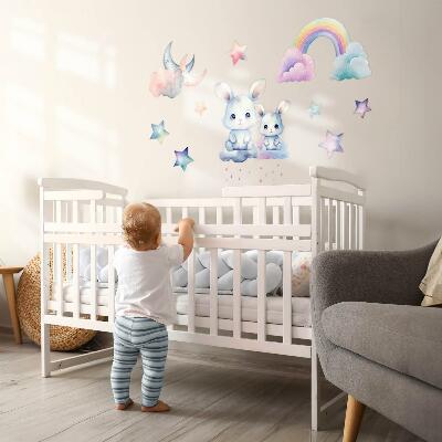 Wandsticker 60x80 Hasen in einem pastellfarbenen Himmel mit Regenbogen und Sternen