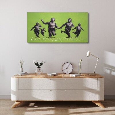 Bild auf leinwand Bereitschaftspolizei am Banksy Field