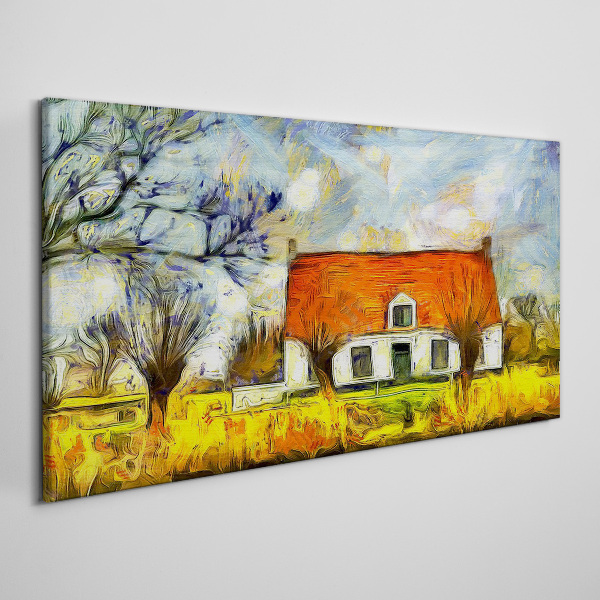 Leinwandbild Ein farbenfrohes Landhaus in der Landschaft