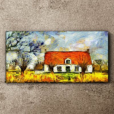 Leinwandbild Ein farbenfrohes Landhaus in der Landschaft