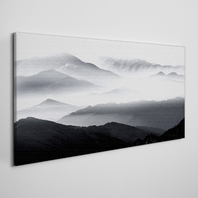 Foto auf leinwand Nebliges Bergpanorama