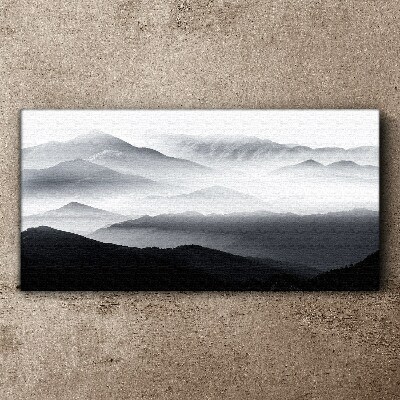 Foto auf leinwand Nebliges Bergpanorama