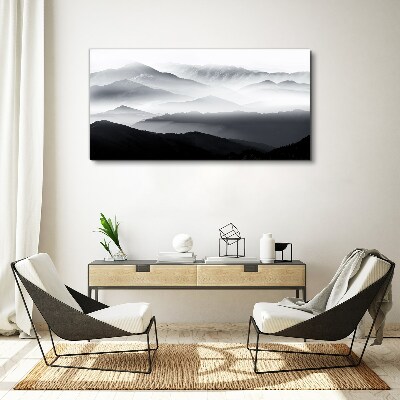 Foto auf leinwand Nebliges Bergpanorama