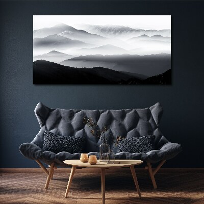 Foto auf leinwand Nebliges Bergpanorama