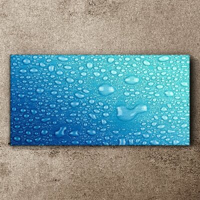 Foto auf leinwand Wassertropfen auf blauem Hintergrund