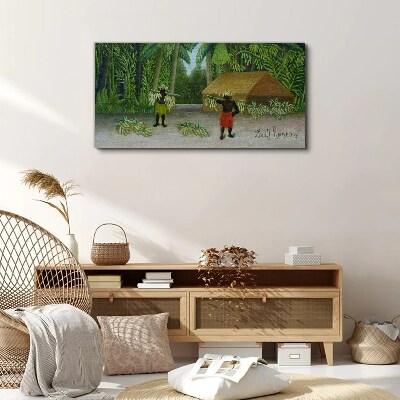 Bild auf leinwand Bananenernte in einer tropischen Landschaft
