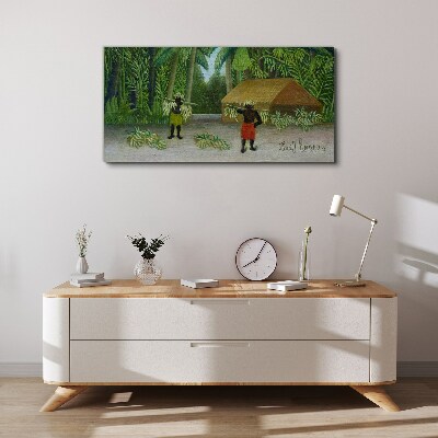 Bild auf leinwand Bananenernte in einer tropischen Landschaft