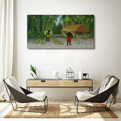 Bild auf leinwand Bananenernte in einer tropischen Landschaft