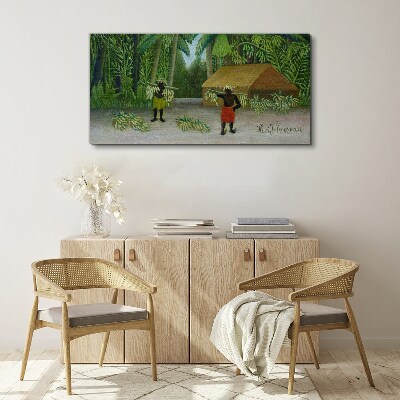 Bild auf leinwand Bananenernte in einer tropischen Landschaft