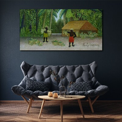Bild auf leinwand Bananenernte in einer tropischen Landschaft