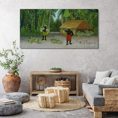 Bild auf leinwand Bananenernte in einer tropischen Landschaft