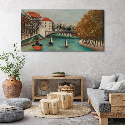Foto auf leinwand Eine friedliche Landschaft mit Booten