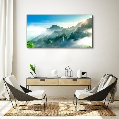 Foto auf leinwand Berglandschaft an einem nebligen Morgen