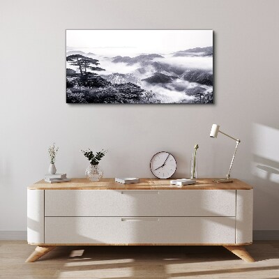 Foto auf leinwand Nebliges Bergpanorama