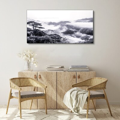 Foto auf leinwand Nebliges Bergpanorama