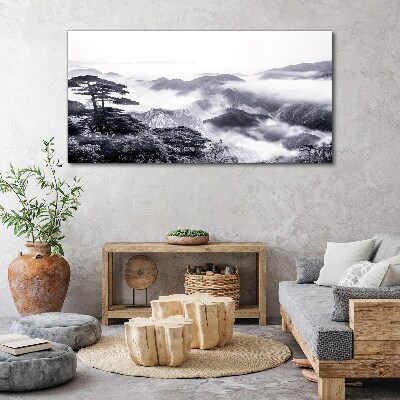 Foto auf leinwand Nebliges Bergpanorama