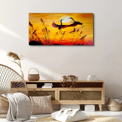Foto auf leinwand Tanzende Kraniche bei Sonnenuntergang