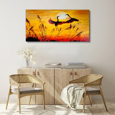 Foto auf leinwand Tanzende Kraniche bei Sonnenuntergang