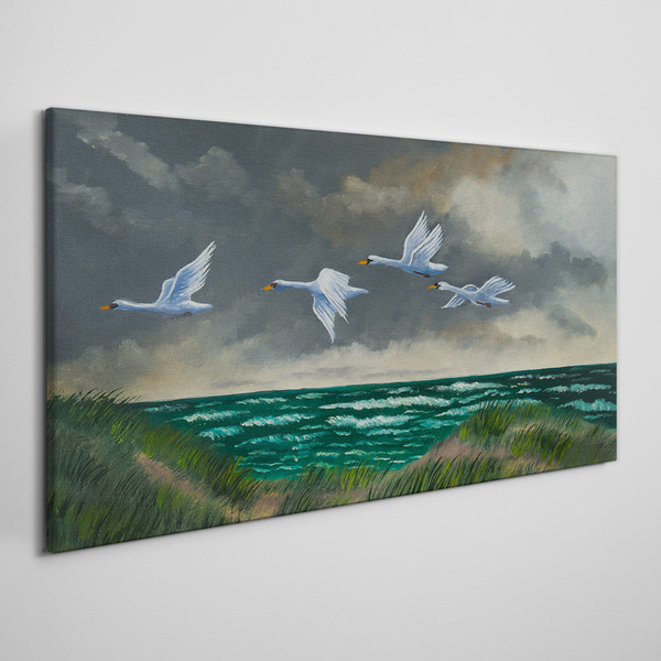 Bild auf leinwand Flug der Schwäne über dem Meer
