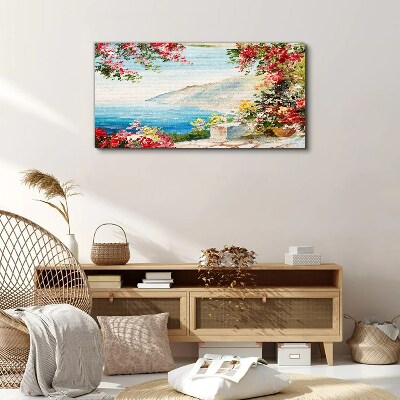 Foto auf leinwand Sommerliche Küstenlandschaft mit Blumen