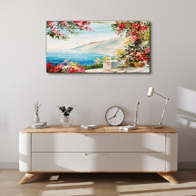 Foto auf leinwand Sommerliche Küstenlandschaft mit Blumen