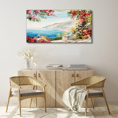 Foto auf leinwand Sommerliche Küstenlandschaft mit Blumen