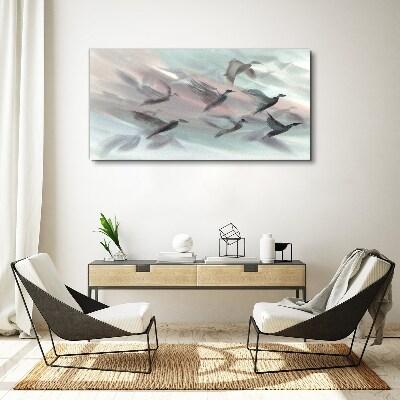 Bild auf leinwand Vogelflug in pastellfarbener Aura