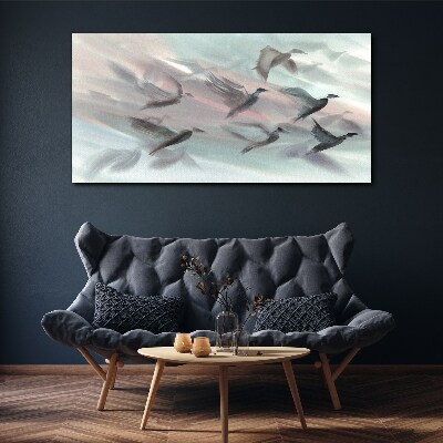 Bild auf leinwand Vogelflug in pastellfarbener Aura