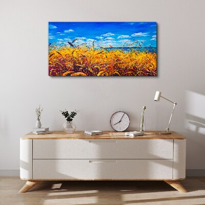Foto auf leinwand Goldene Felder unter blauem Himmel