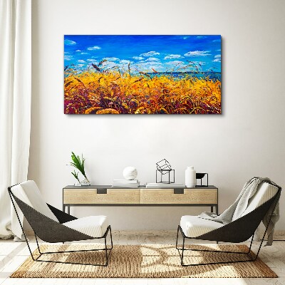 Foto auf leinwand Goldene Felder unter blauem Himmel