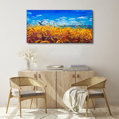 Foto auf leinwand Goldene Felder unter blauem Himmel