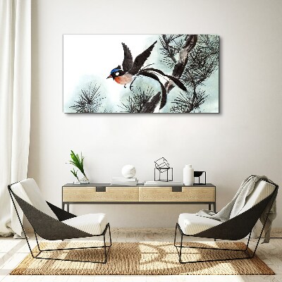 Foto auf leinwand Ein Vogel im Flug über den Kiefern