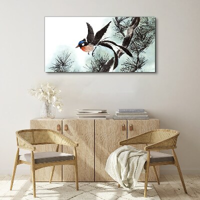 Foto auf leinwand Ein Vogel im Flug über den Kiefern