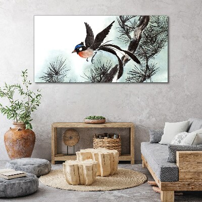 Foto auf leinwand Ein Vogel im Flug über den Kiefern