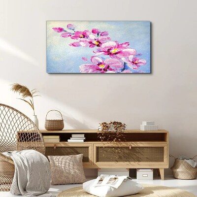 Foto auf leinwand Rosa Orchideen auf blauem Hintergrund