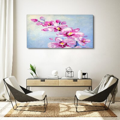 Foto auf leinwand Rosa Orchideen auf blauem Hintergrund