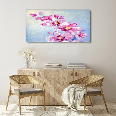 Foto auf leinwand Rosa Orchideen auf blauem Hintergrund