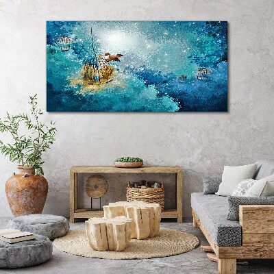 Foto auf leinwand Ein eingesperrter Vogel gegen den Himmel