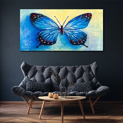 Foto auf leinwand Blauer Schmetterling auf abstraktem Hintergrund