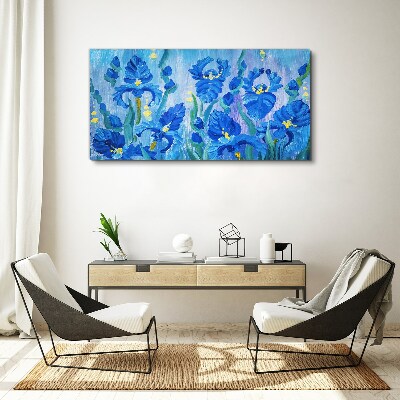 Foto auf leinwand Blaue Schwertlilien vor blauem Hintergrund