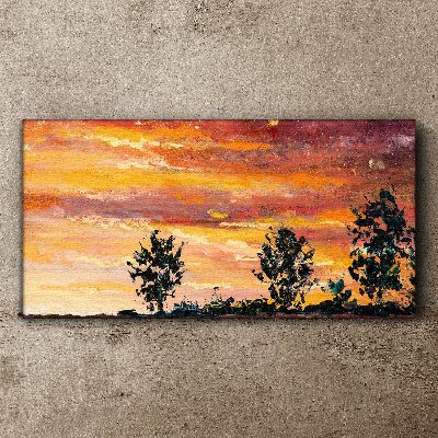 Foto auf leinwand Sonnenuntergang über den Bäumen