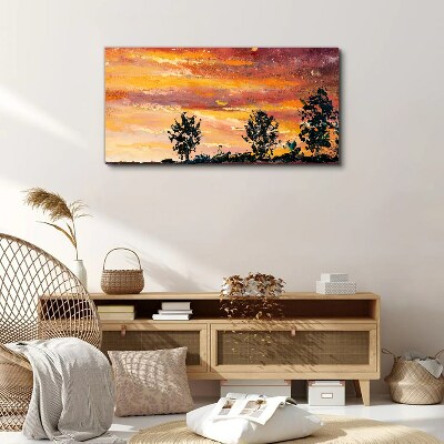 Foto auf leinwand Sonnenuntergang über den Bäumen
