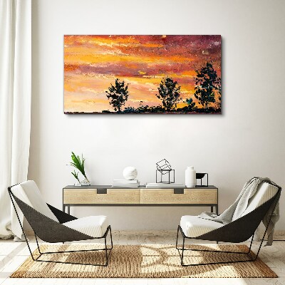 Foto auf leinwand Sonnenuntergang über den Bäumen