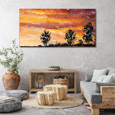 Foto auf leinwand Sonnenuntergang über den Bäumen