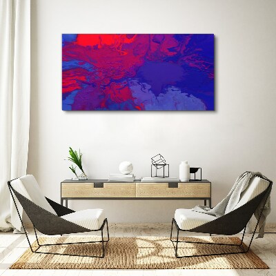 Leinwandbild Eine Welle von Farben in Lila und Blau
